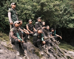 On patrol: Communities like the A'i Kofan now monitor their ancestral territory in the Amazon with traditional spears and GPS devices to document illegal activities and exploration. Photo: Nico Kingman